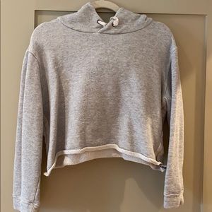 Grey cropped hoodie with creme detail on side